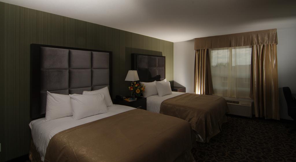 Paradise Inn And Suites Redwater Habitación foto